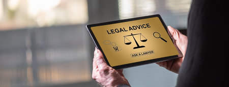 Tablet screen displaying a legal advice conceptの写真素材