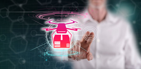 Man touching a drone delivery concept on a touch screen with his finger