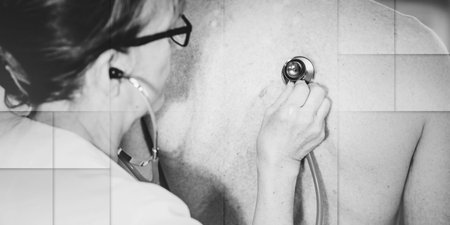 Female doctor using stethoscope to examine patient, geometric patternの写真素材