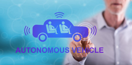 Man touching an autonomous vehicle concept on a touch screen with his fingerの写真素材
