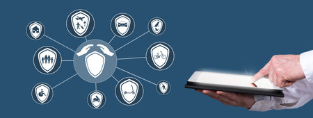 Finger pointing on digital tablet with insurance concept on background