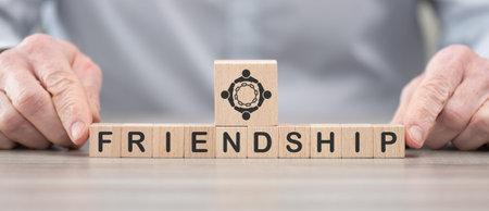 Wooden blocks with symbol of friendship conceptの写真素材