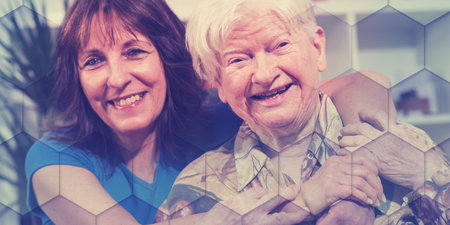Portrait of happy grandmother with her daughter in visit, geometric patternの写真素材