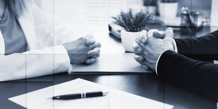 Situation of business negotiation between businesswoman and businessman (lorem ipsum text used), geometric patternの写真素材