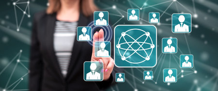 Woman touching a social media network concept on a touch screen with her fingersの写真素材