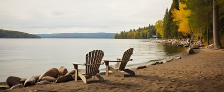 Wooden chairs on the shore of a lake. Concept of calmの素材
