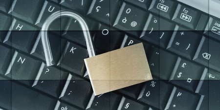 Computer security concept with a padlock on a keyboard, geometric patternの写真素材