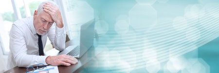 Stressed businessman sitting in office with hand on forehead; panoramic banner