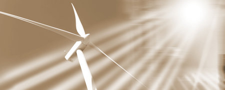 Bottom view of wind turbine on blue sky background; multiple exposure