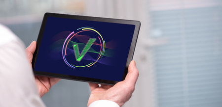 Tablet screen displaying a validation conceptの写真素材