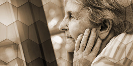 Portrait of elderly woman looking out the window and dreaming, geometric pattern