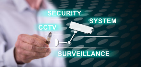 Man touching a cctv concept on a touch screen with a penの写真素材