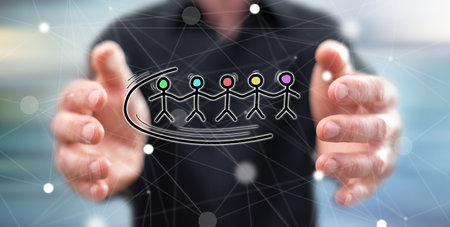 Teamwork concept between hands of a man in backgroundの写真素材