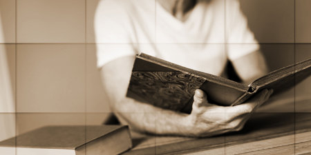 Man sitting reading a book, geometric pattern