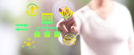 Woman touching a knowledge sharing concept on a touch screen with her fingers