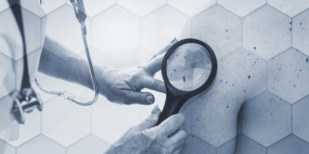 Dermatologist examining the skin on the arm of a patient, geometric patternの写真素材