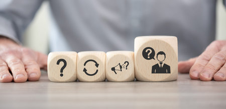 Wooden blocks with symbol of question concept