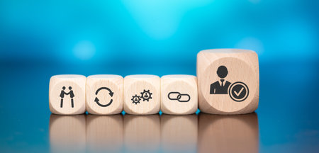 Wooden blocks with symbol of trust concept on blue background
