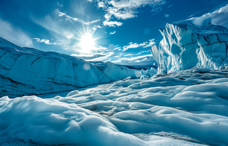 Majestic arctic glacier landscape under bright sunlight, showcasing intricate ice formations and a vibrant blue skyの素材