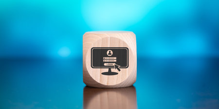 Wooden block with symbol of login concept on blue backgroundの写真素材