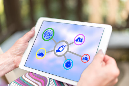 Female hands holding a tablet with 5g concept
