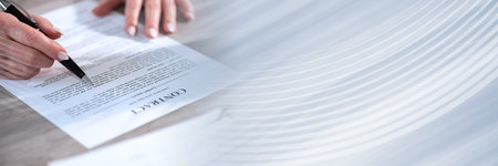 Female hands checking content of a contract; panoramic banner