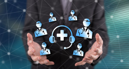 Online medical support concept above the hands of a man in background