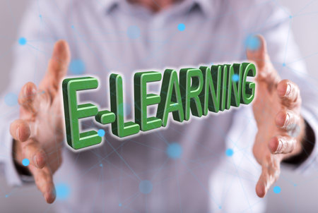 E-learning concept between hands of a man in background