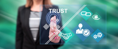 Woman touching a trust concept on a touch screen with her fingers
