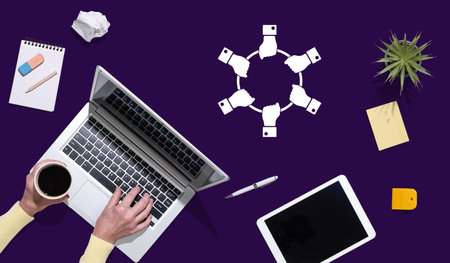 Top view of hands using laptop with symbol of business relationship concept