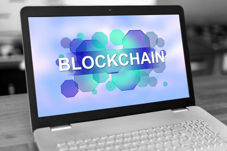 Laptop screen with blockchain concept