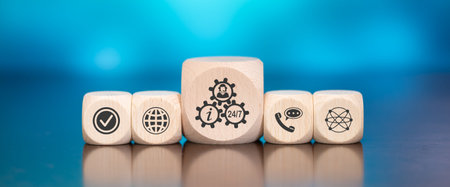 Wooden blocks with symbol of customer service concept on blue background