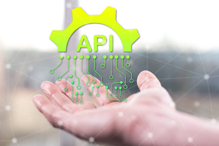 Api concept above a hand of a man