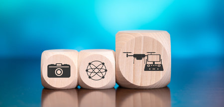 Wooden blocks with symbol of drone concept on blue background