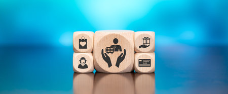 Wooden blocks with symbol of customer loyalty concept on blue background