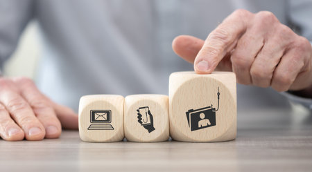 Wooden blocks with symbol of phishing concept