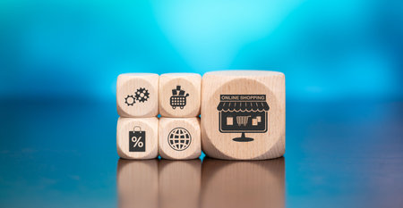 Wooden blocks with symbol of online shopping concept on blue background