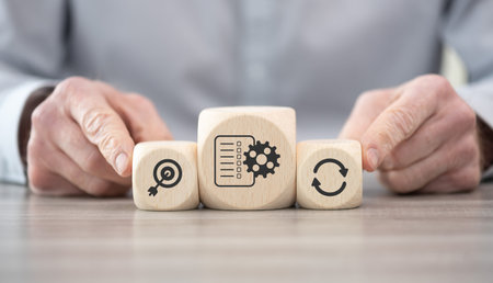 Wooden blocks with symbol of workflow concept