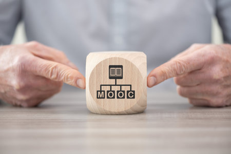 Wooden block with symbol of mooc conceptの写真素材