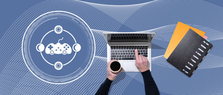 Top view of hands using laptop with symbol of video game addiction concept