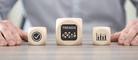 Wooden blocks with symbol of trends conceptの写真素材