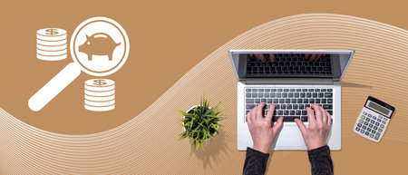 Top view of hands using laptop with symbol of money management conceptの写真素材