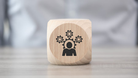 Wooden block with symbol of competence conceptの写真素材