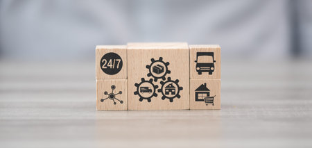 Wooden blocks with symbol of home delivery concept