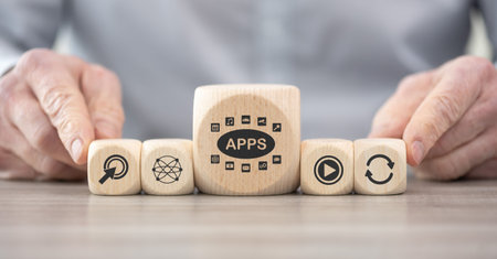 Wooden blocks with symbol of apps conceptの写真素材