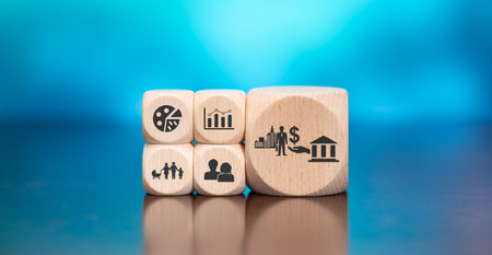 Wooden blocks with symbol of government aid concept on blue backgroundの写真素材
