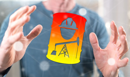 Opec concept between hands of a man in backgroundの写真素材