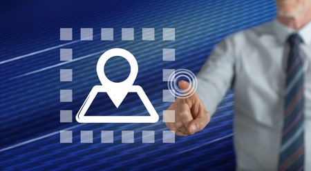 Man touching a navigation system concept on a touch screen with his fingerの写真素材