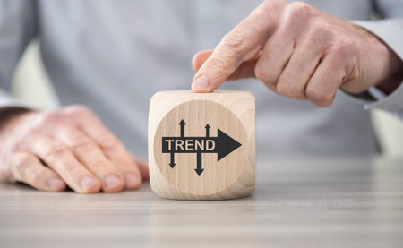 Wooden block with symbol of trends conceptの写真素材