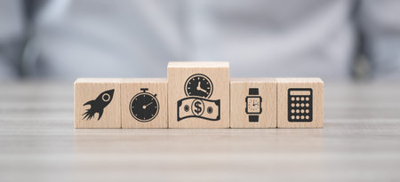 Wooden blocks with symbol of time is money concept
